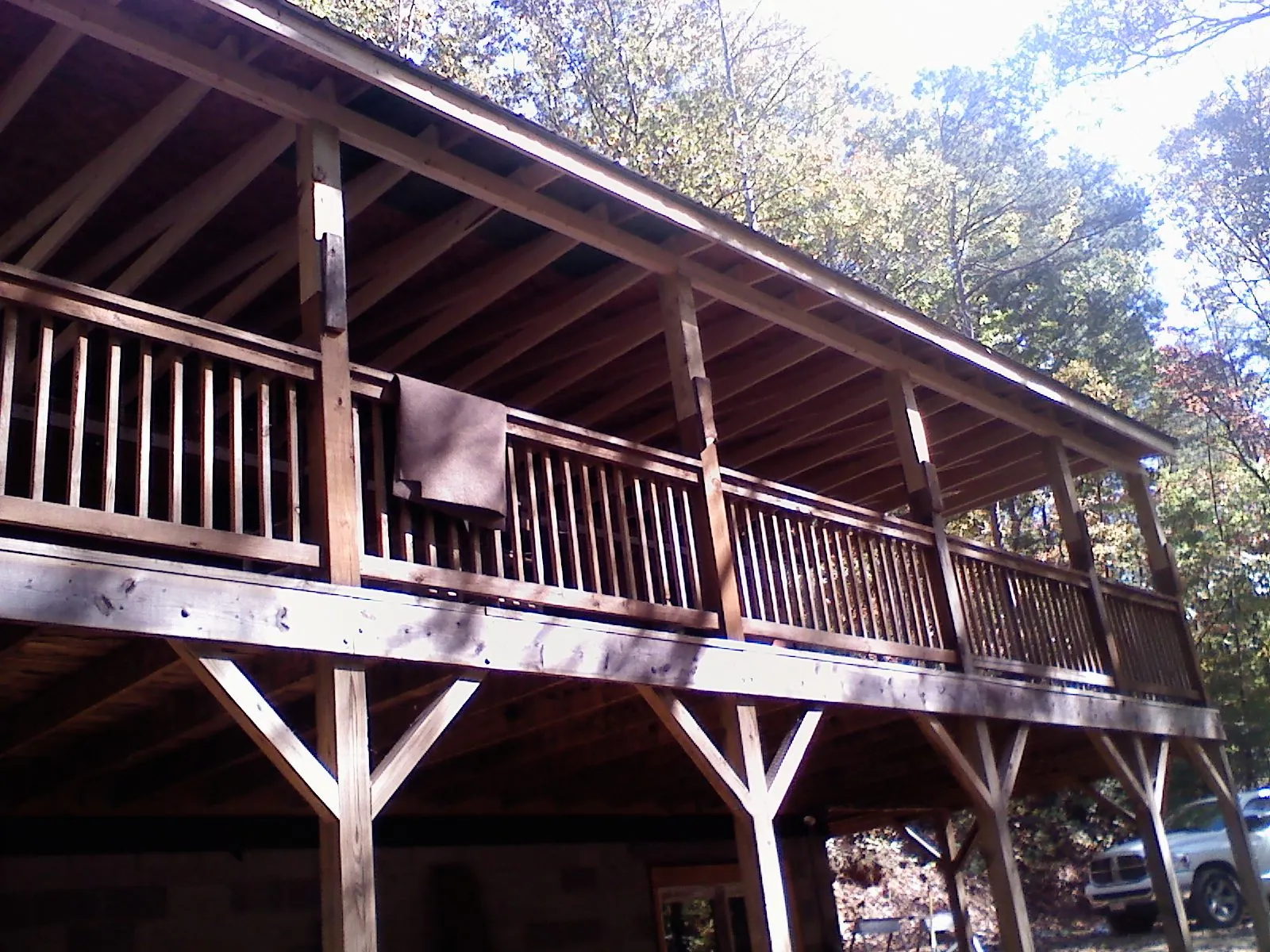 Timber framing under a new elevated porch and deck — Roof Leak Repair in Jones by Roofing Brothers